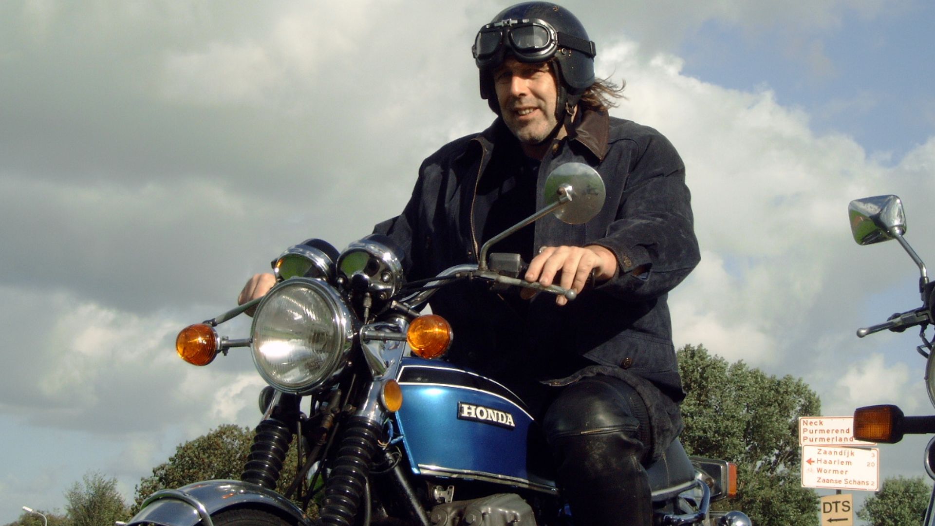 Not only the motorcycle is real; it's the man in the saddle.... Honda CB750 K2 Electrafying in blue