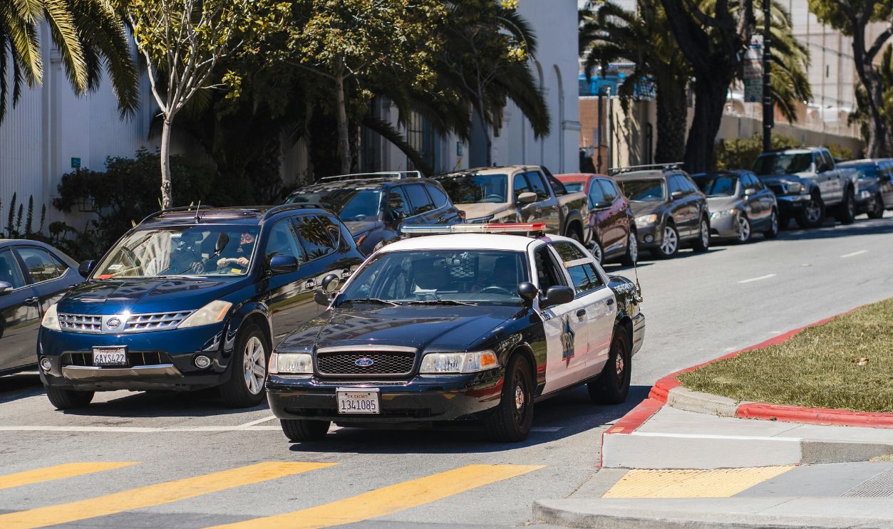 Urban scene with police car in San Francisco