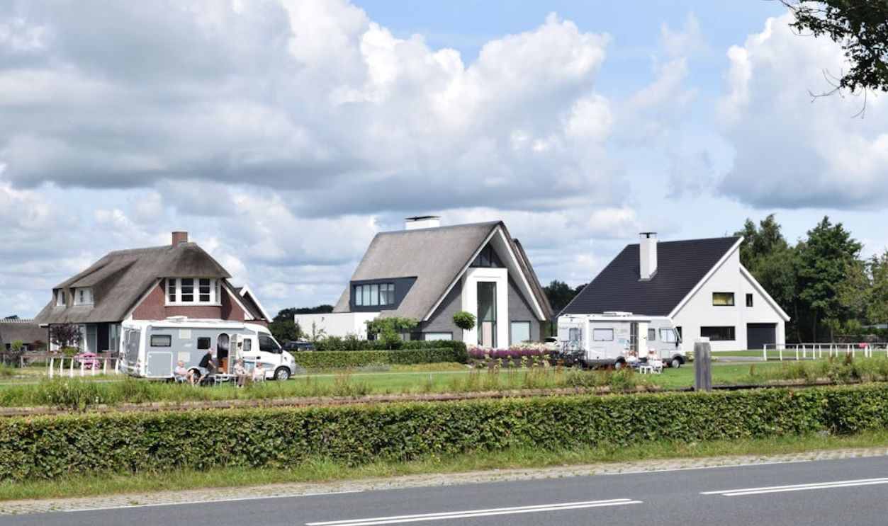 Suburban houses in sunny summer day