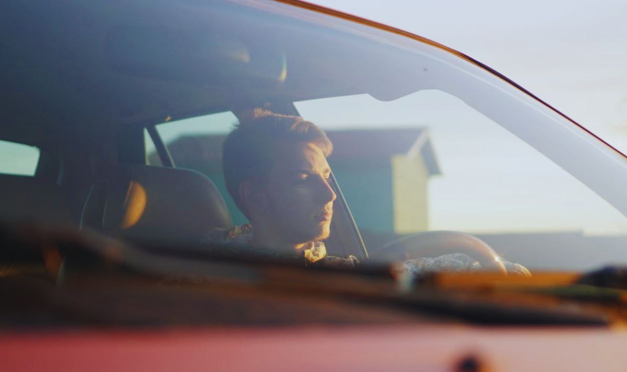 A Man Sitting Inside the Car