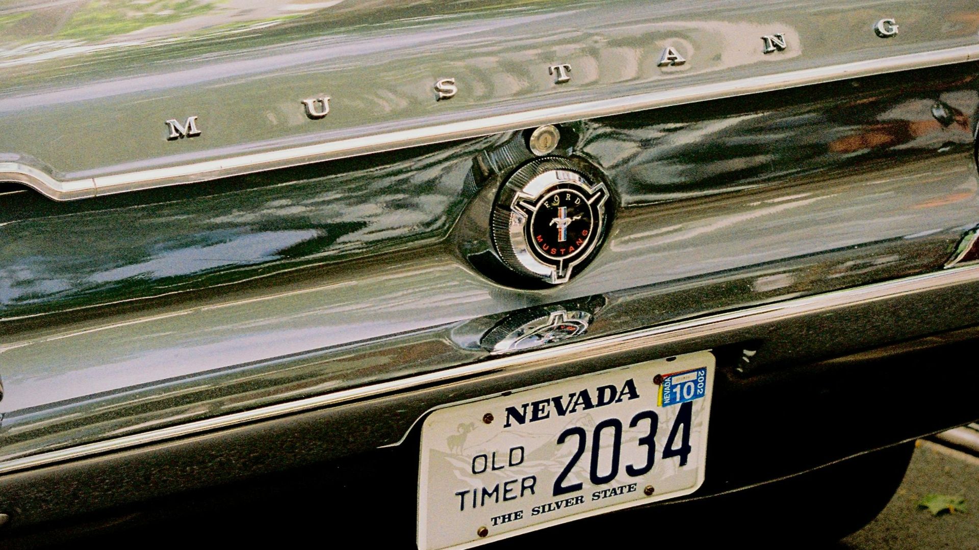 Close-up of a classic Mustang with Nevada plates parked in Berlin, Germany.