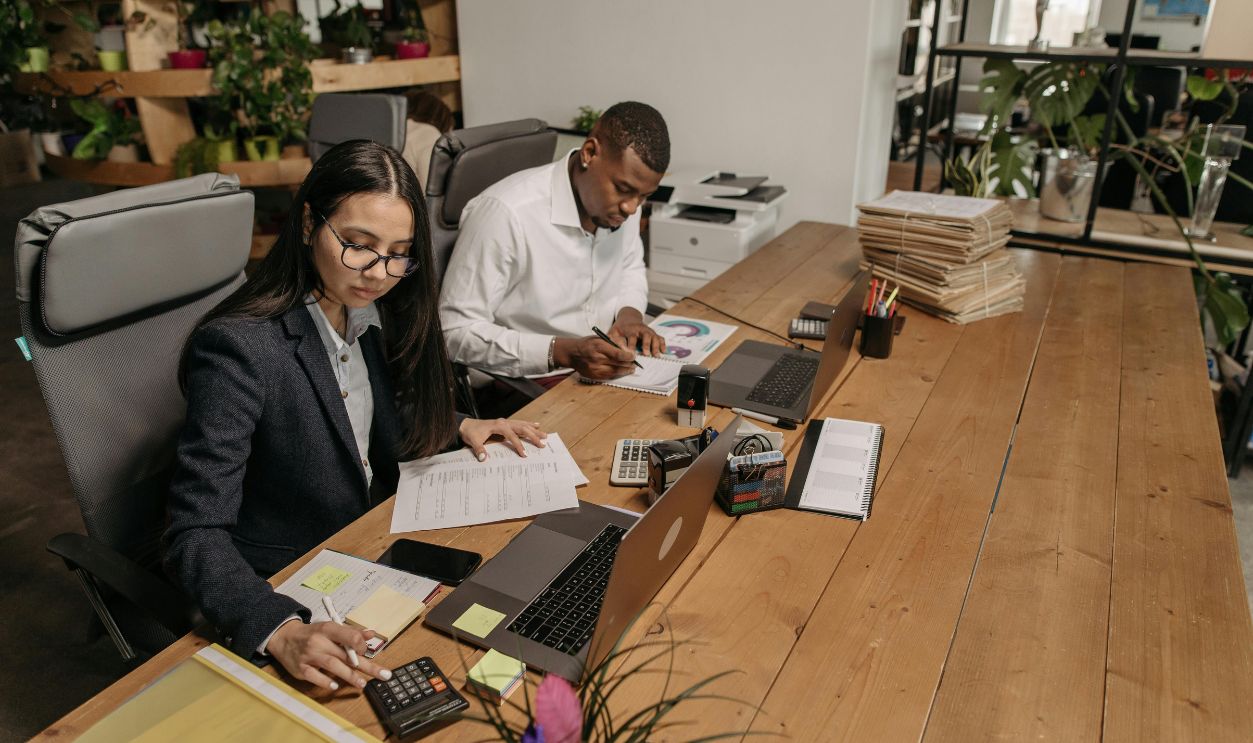 Man and Woman Working in the Office