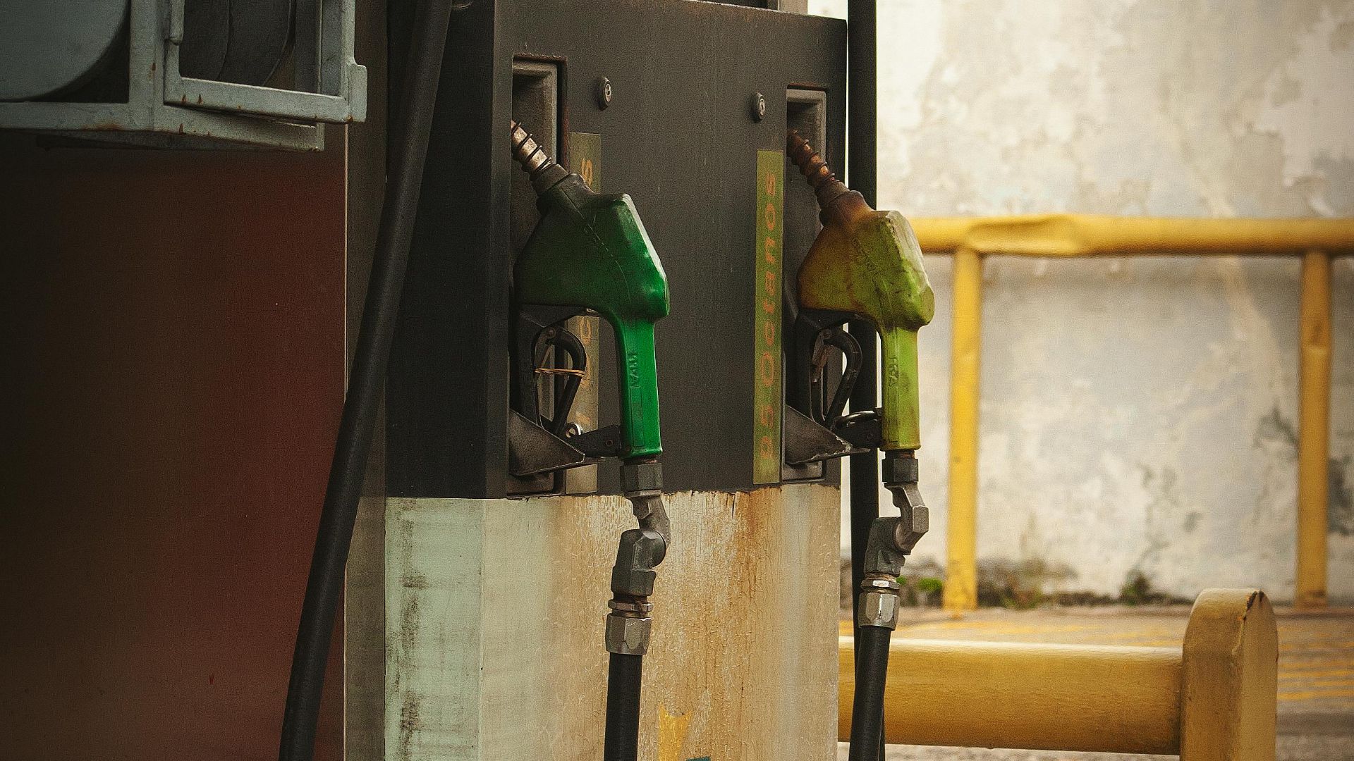 Old and shabby gasoline pump at an abandoned gas station in Venezuela.