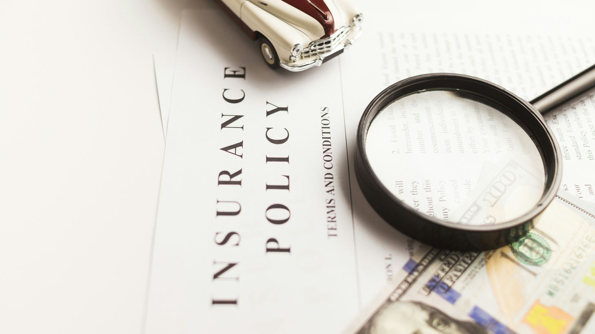 a magnifying glass sitting on top of a piece of paper