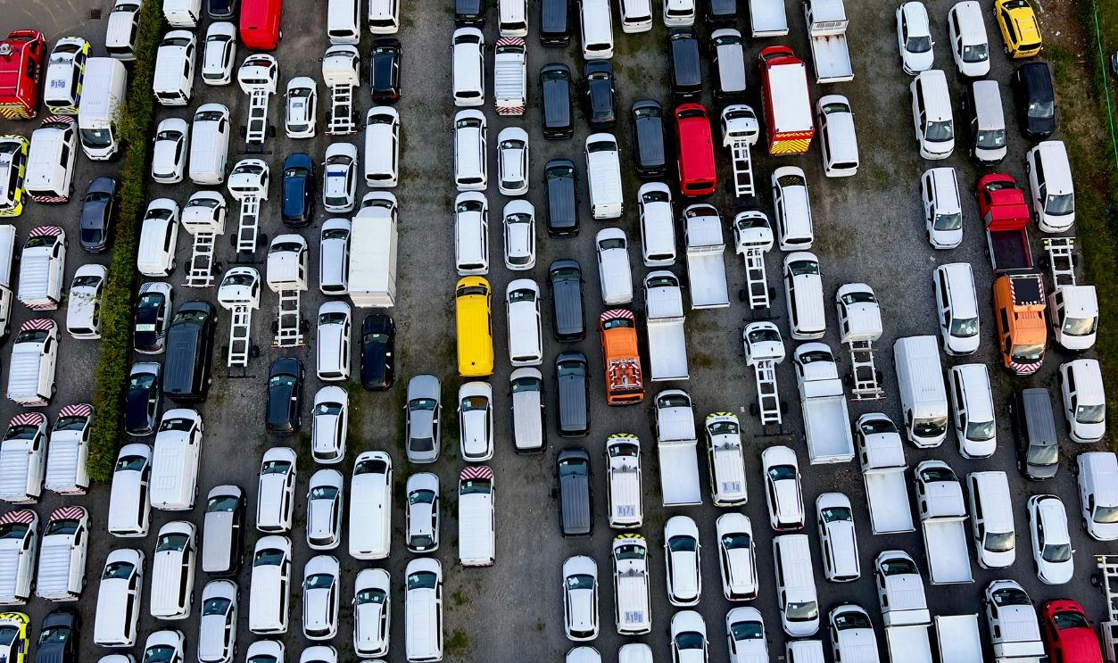 Aerial Shot of Vehicle Parking Lot Arrangement