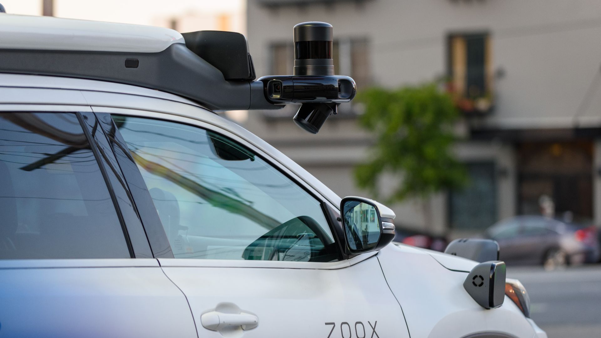 Cameras and lidar sensors on the front of a Toyota Highlander modified for use as an autonomous vehicle testbed by self-driving car company Zoox in San Francisco.