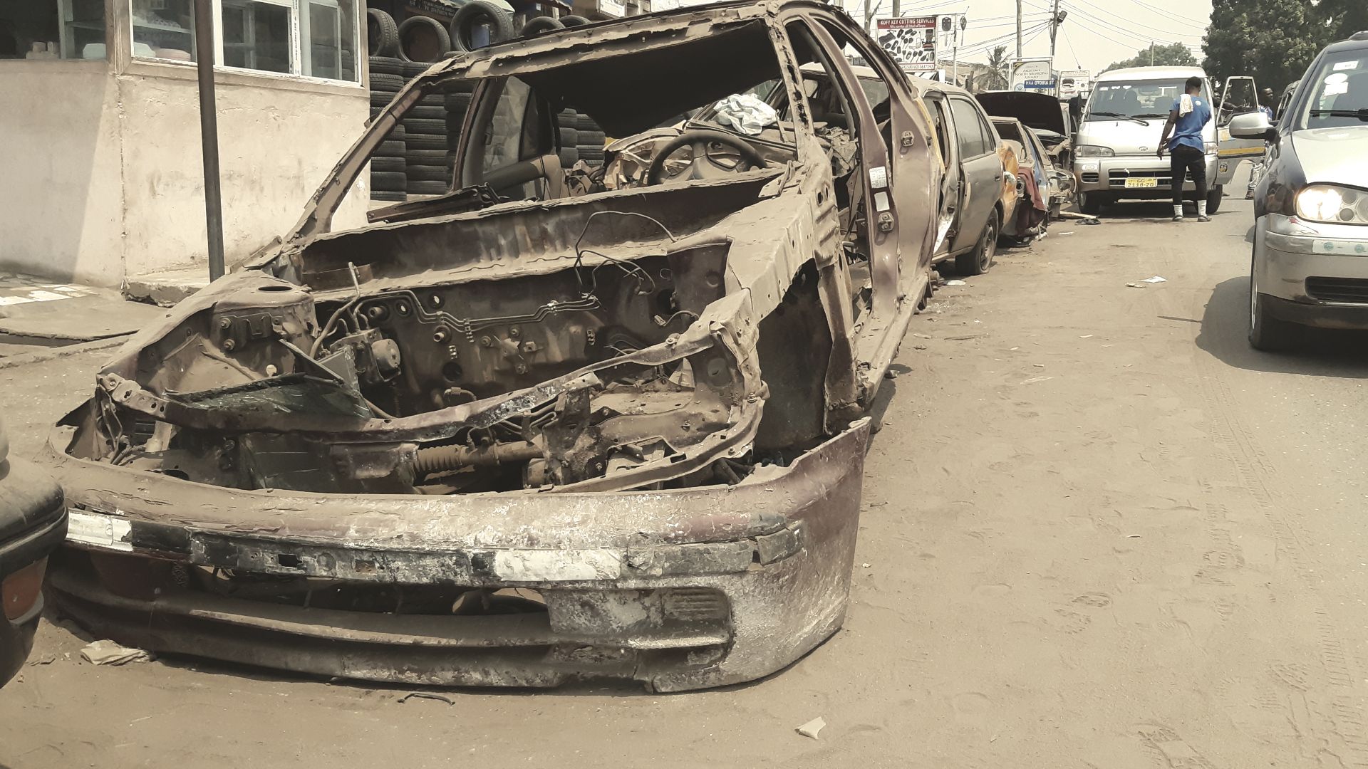 a damaged car at a car repair shop