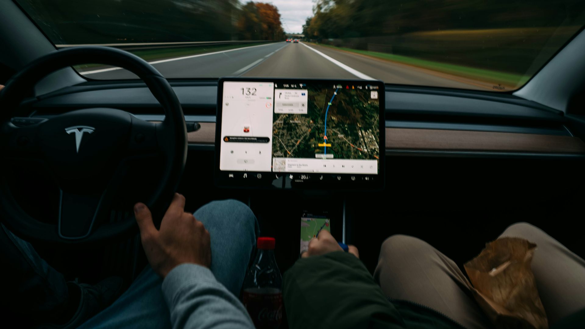 2 person sitting on car seat