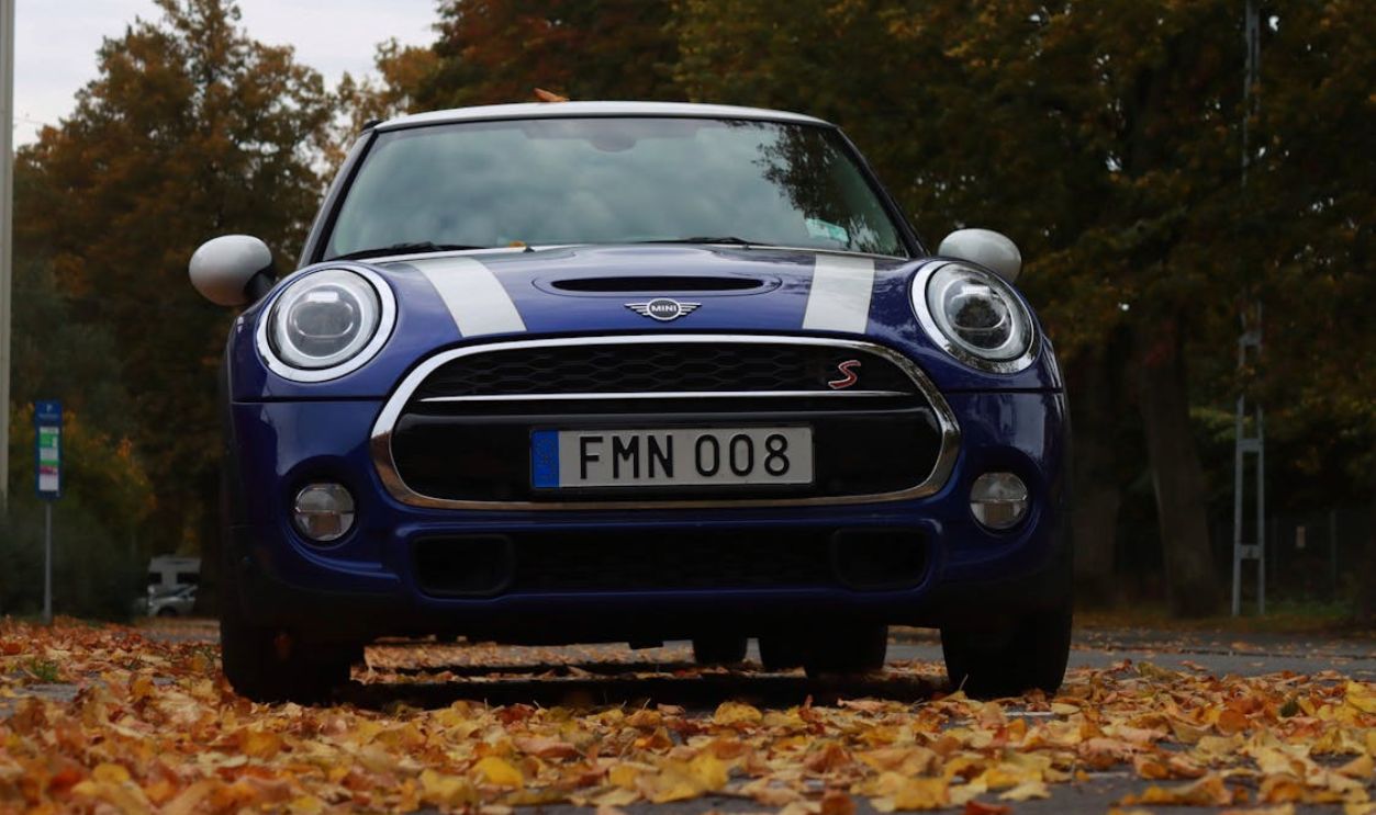 Blue Car Parked on Road Side