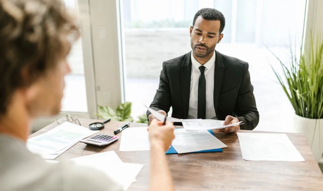 Professional Man holding Papers
