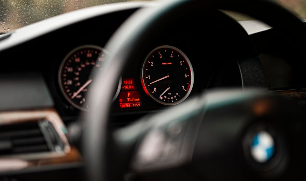 Black and Red Analog Speedometer
