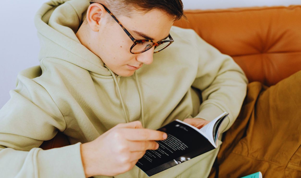 Fine Looking Young Man Reading a Book
