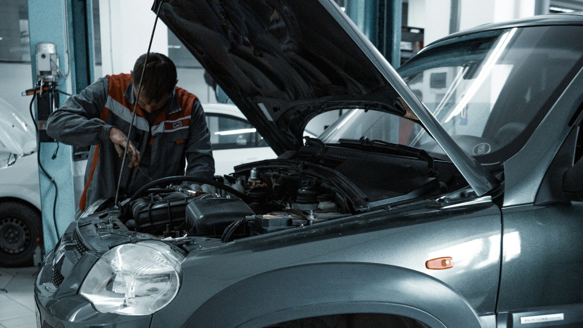 black suv in a garage