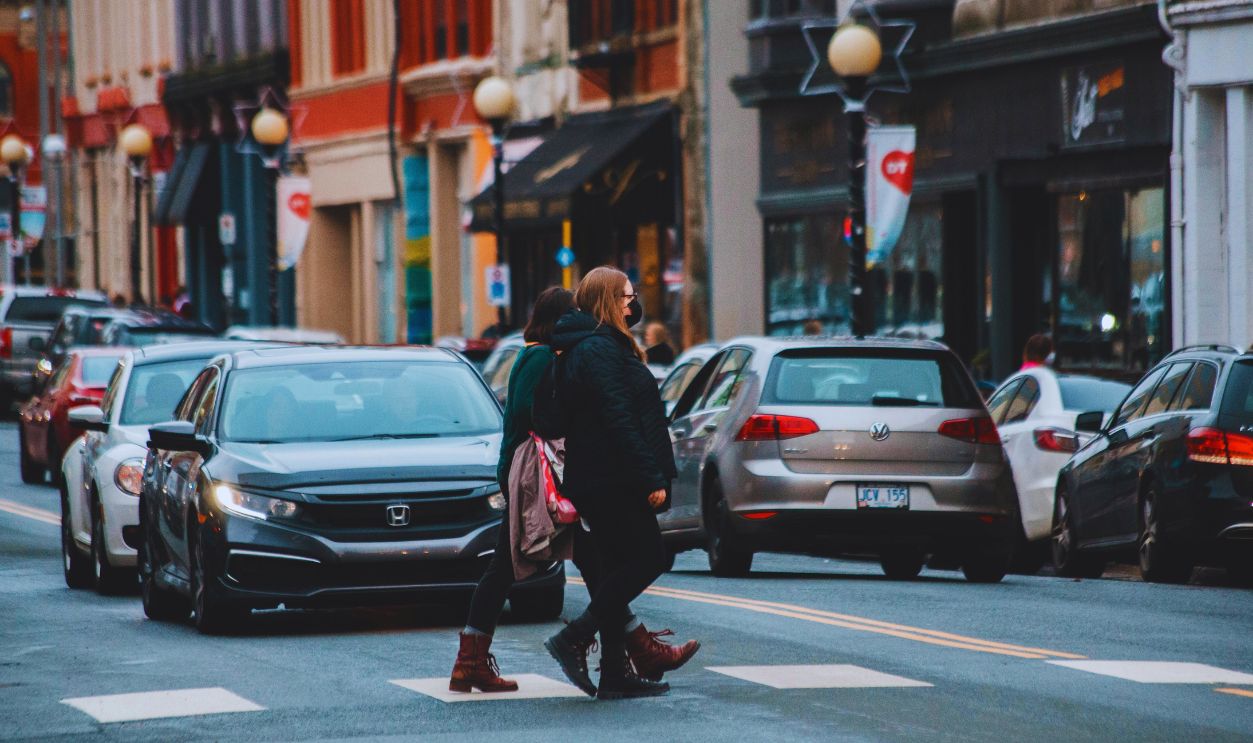 Women walking on city street in daylight