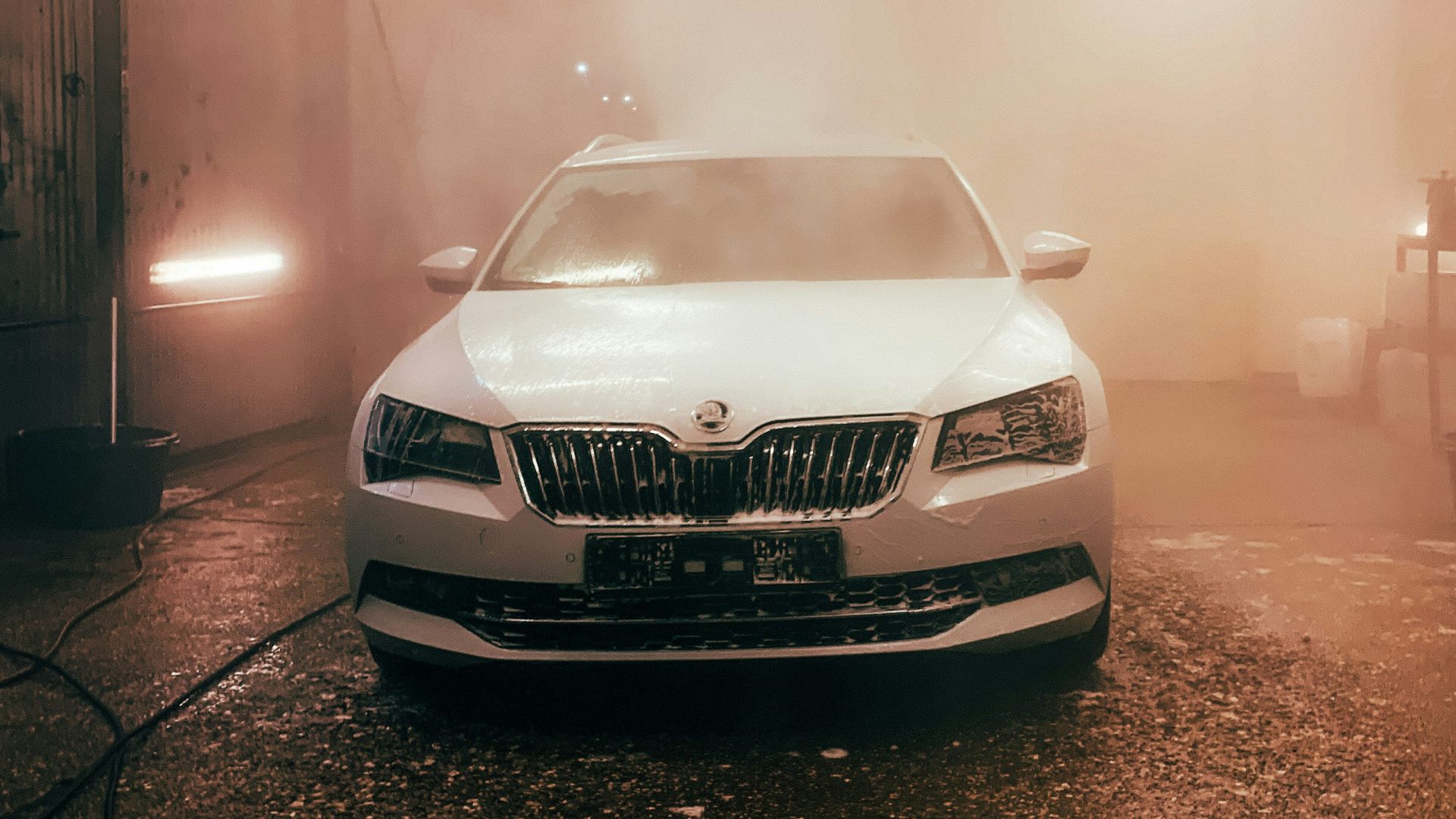 white bmw car on road during daytime