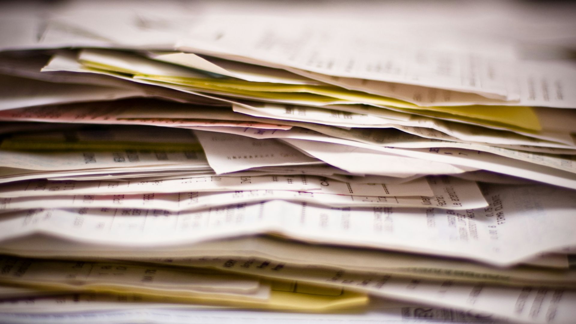 A close-up of a stack of papers.