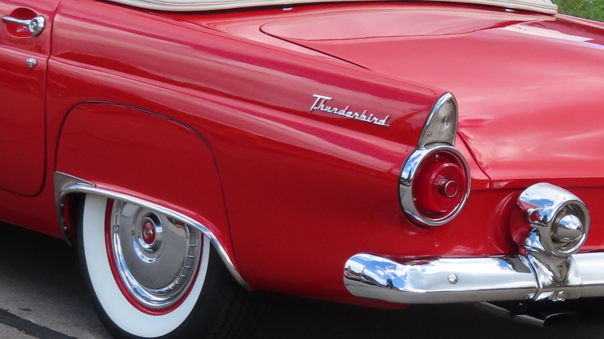 1955 Ford Thunderbird photographed at the 2024 New Brighton Car Cruise in New Brighton, Pennsylvania. Finished in Torch Red.