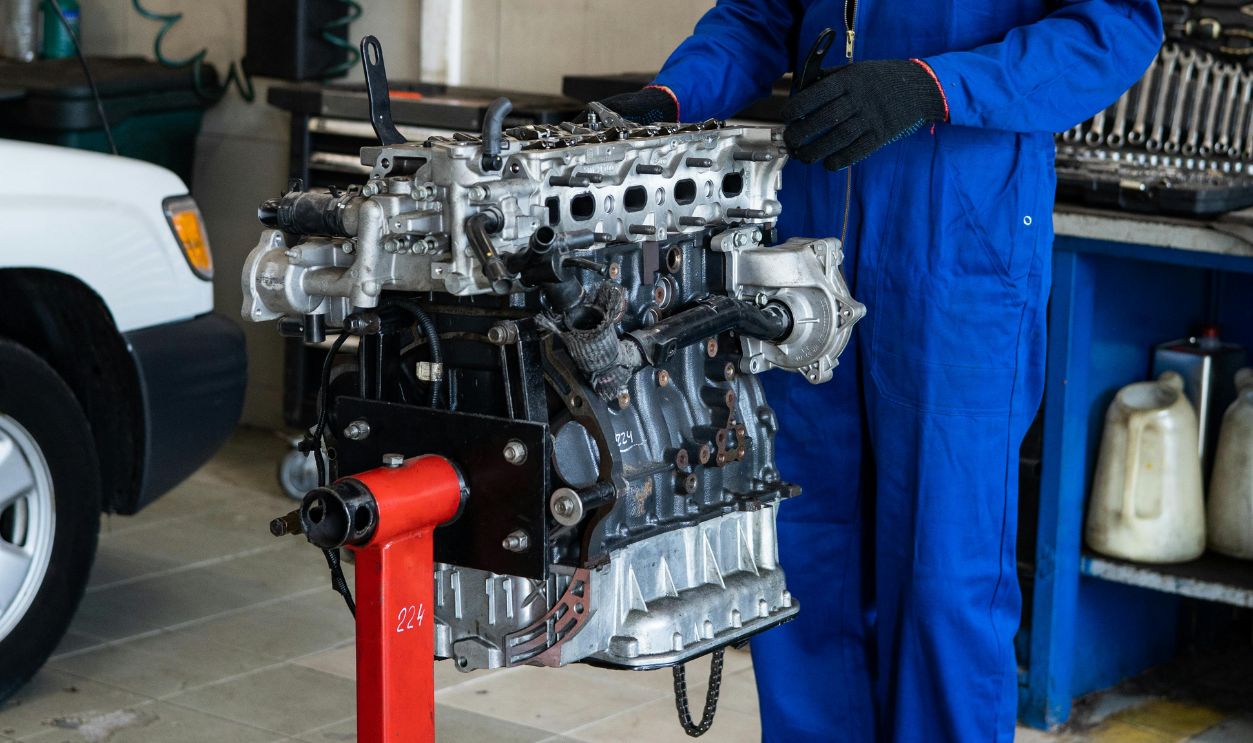 A Mechanic Checking a Car's engine
