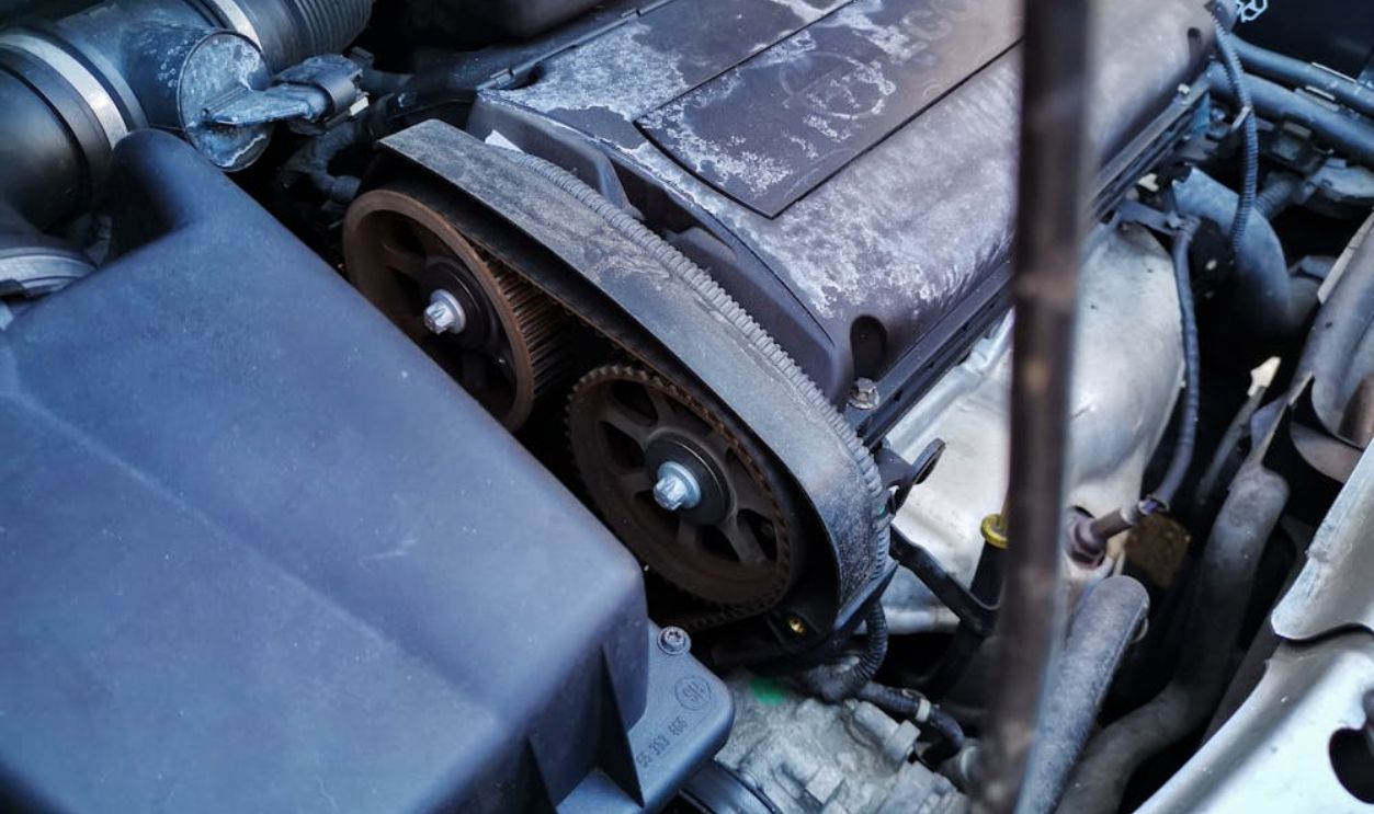 Mechanic Working with Car Engine