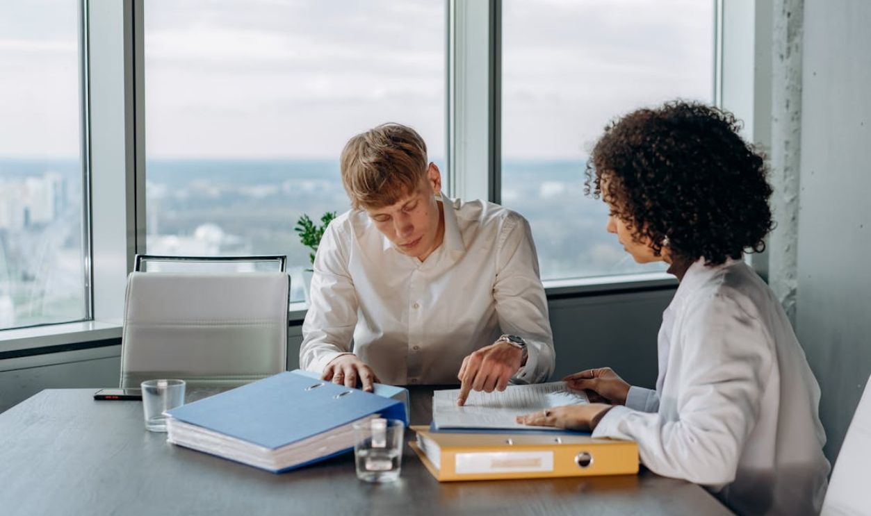 Man and Woman Working in the Office