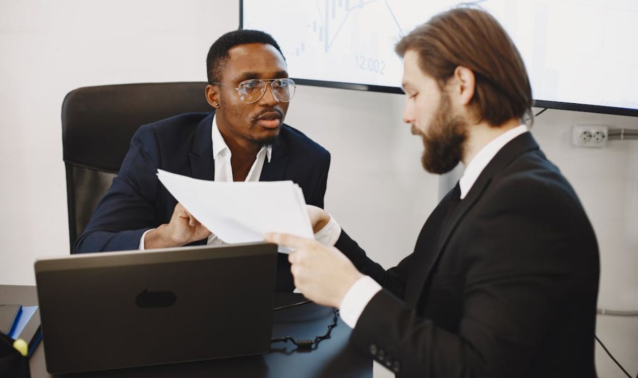 Businessmen with Documents