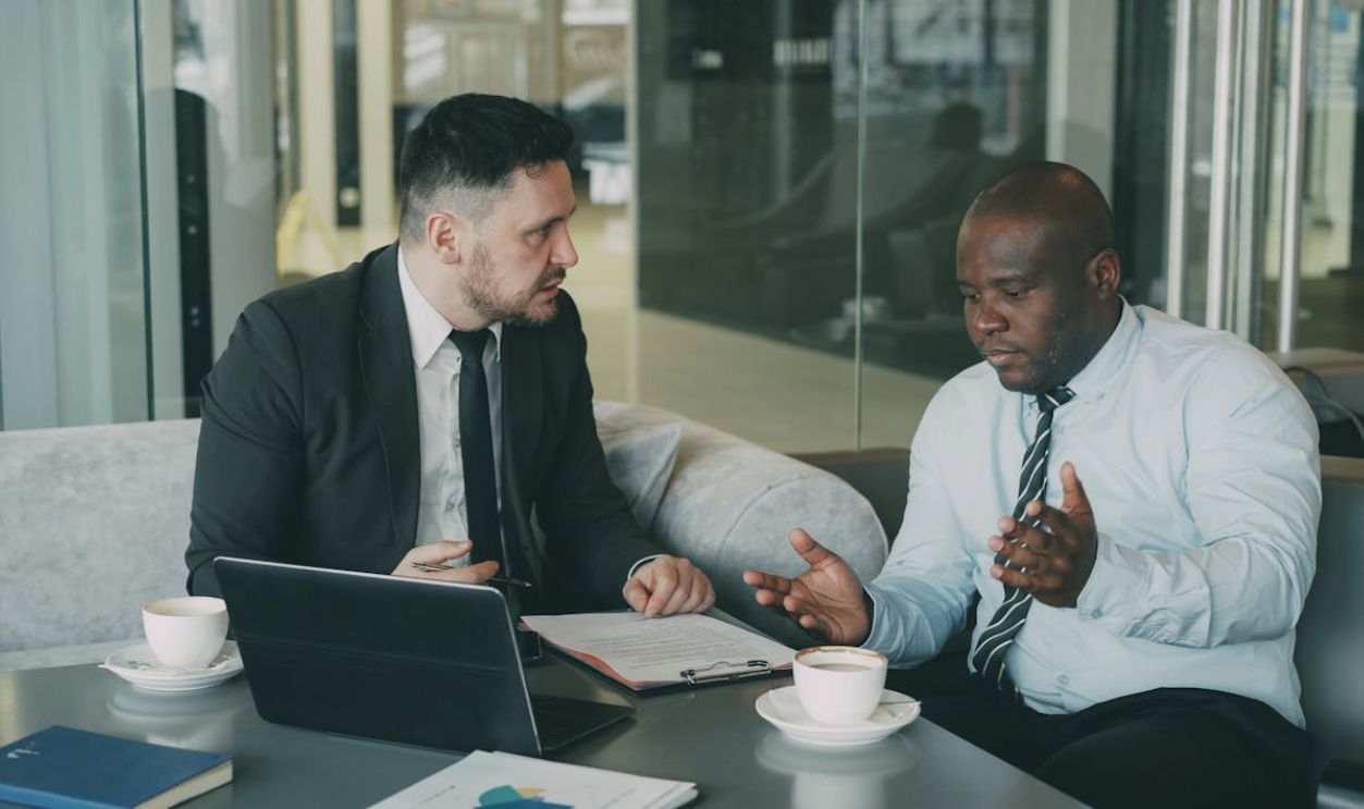 Business Colleagues Meeting Over Coffee
