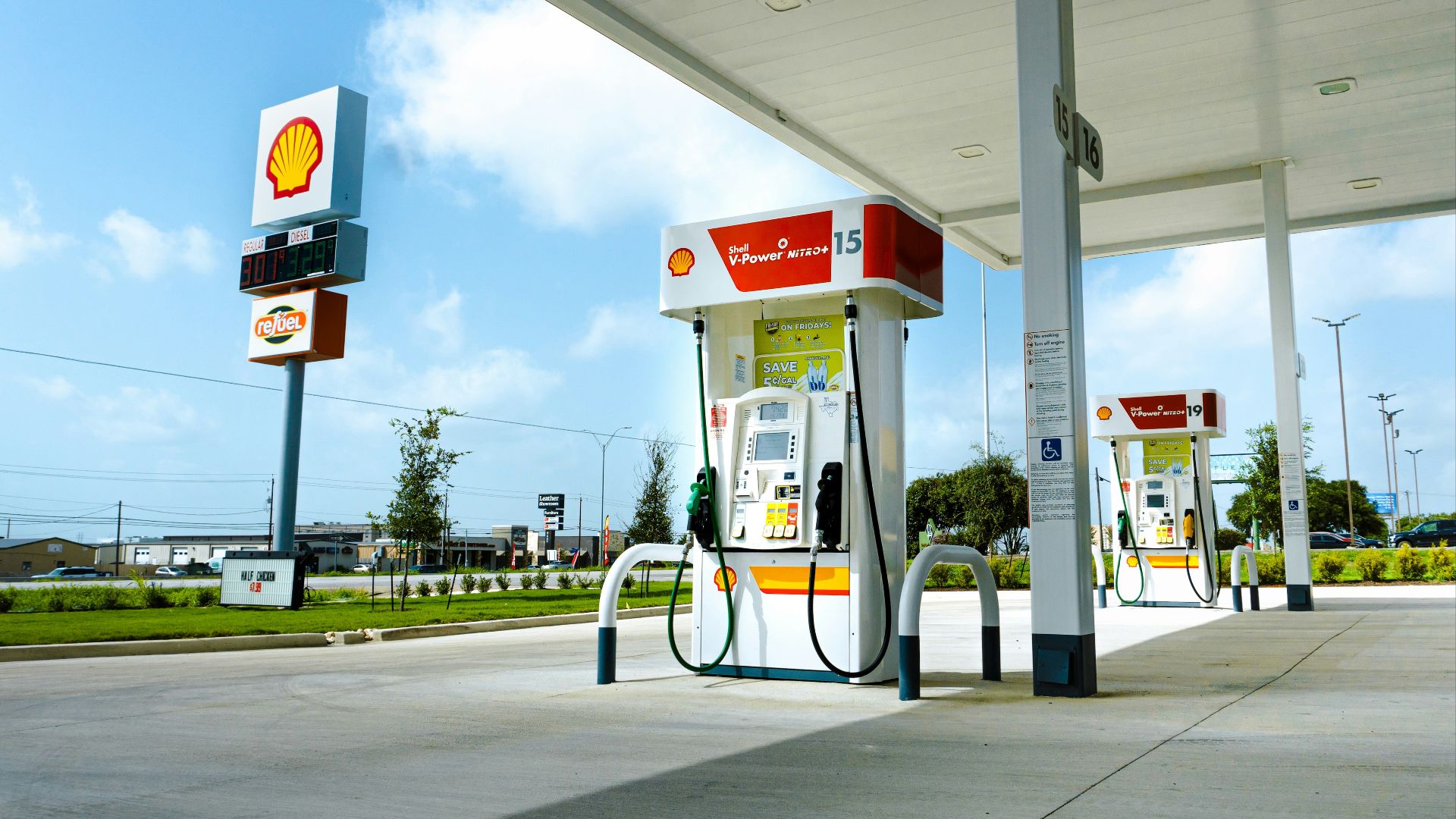 A gas station with a few gas pumps