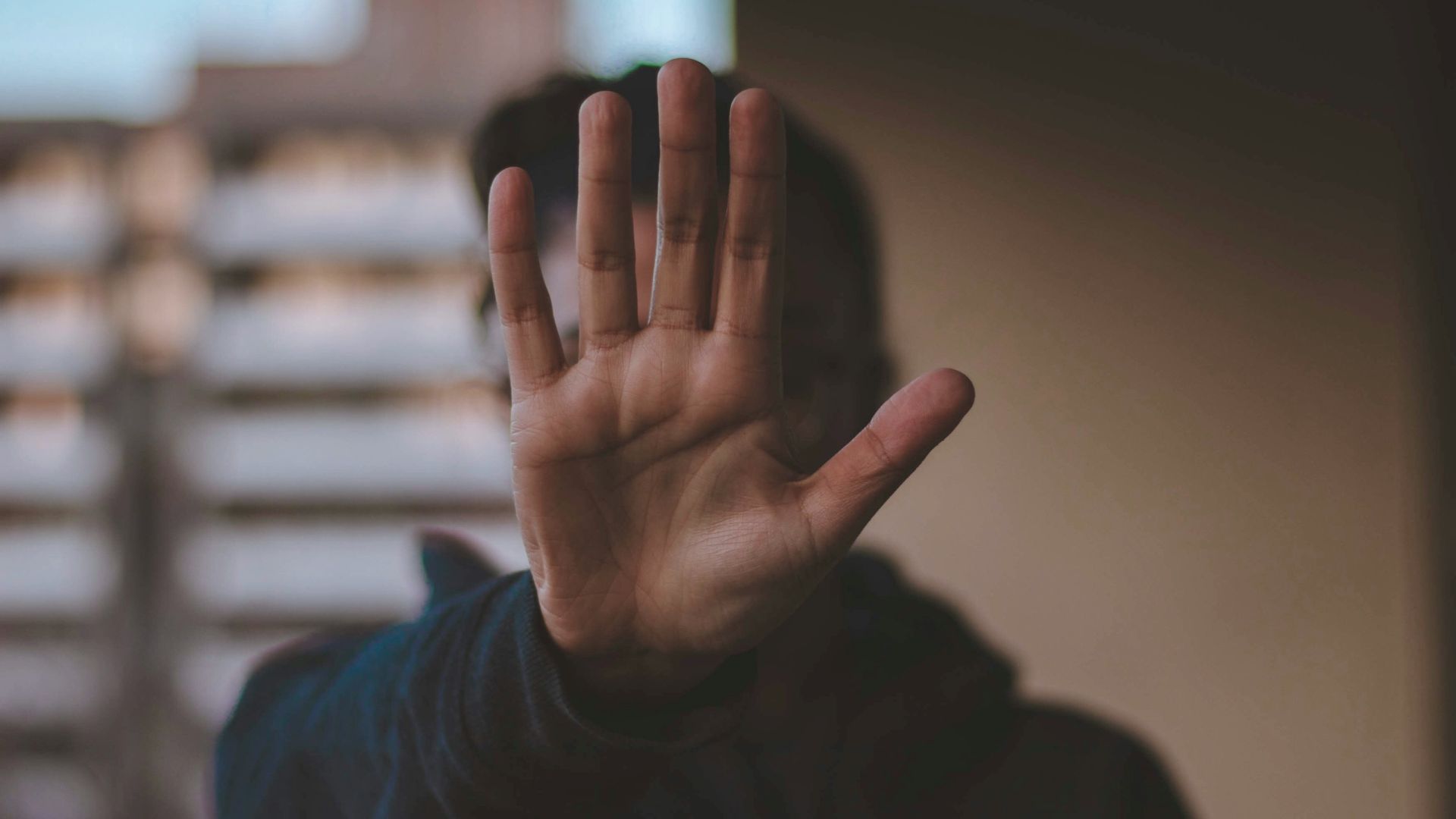 man standing while wearing black jacket