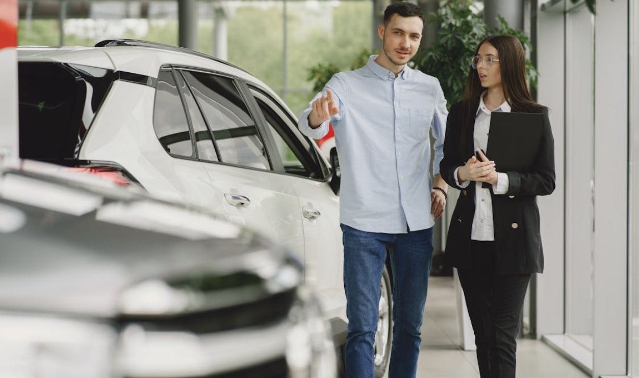 Dealership Employee Selling Car to Client