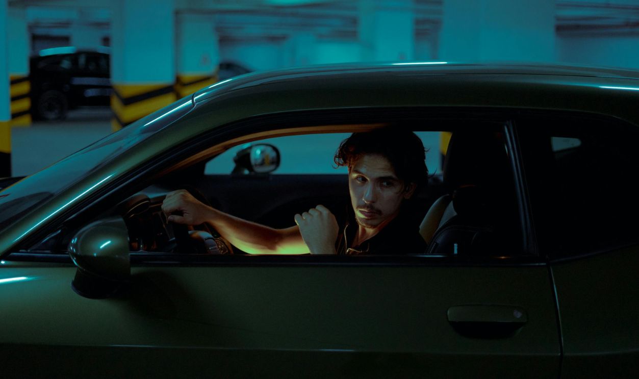 Man in Car at Night