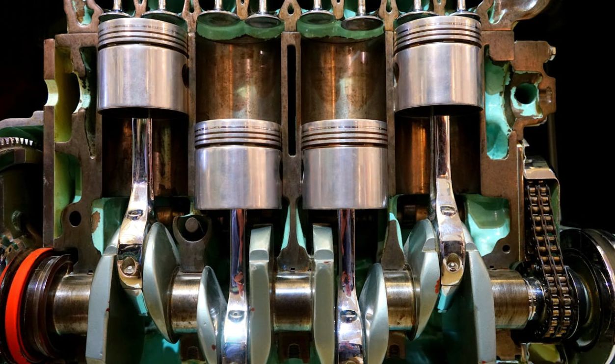 Four Pistons With Connecting Rods on Engine