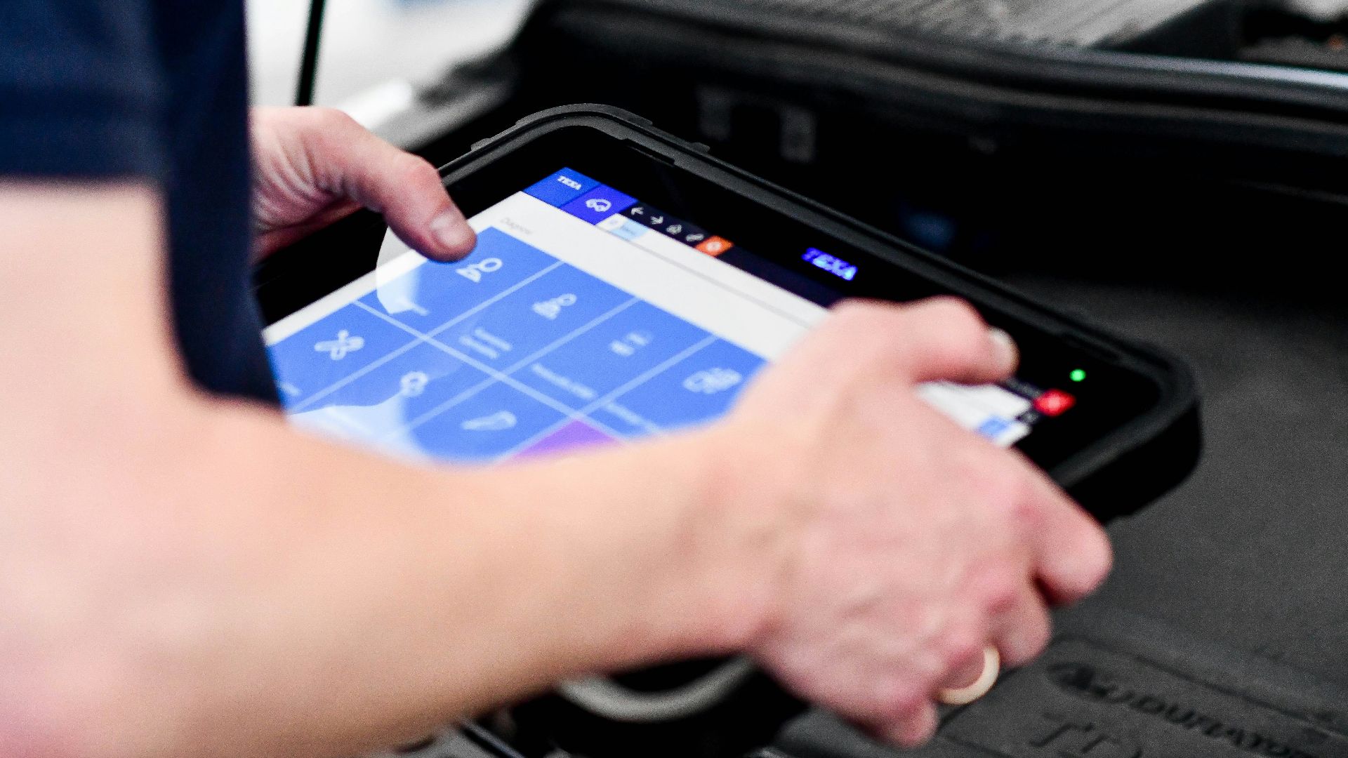 person playing game on black laptop computer