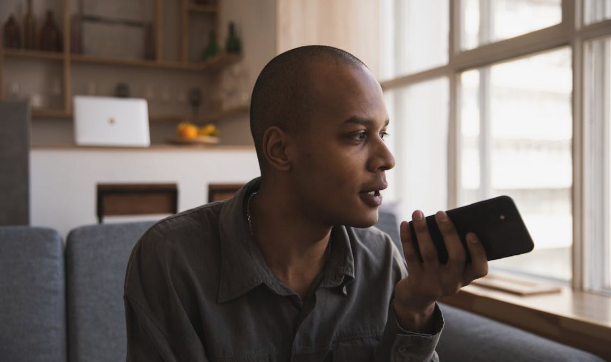 Photo Of Man Talking On The Phone