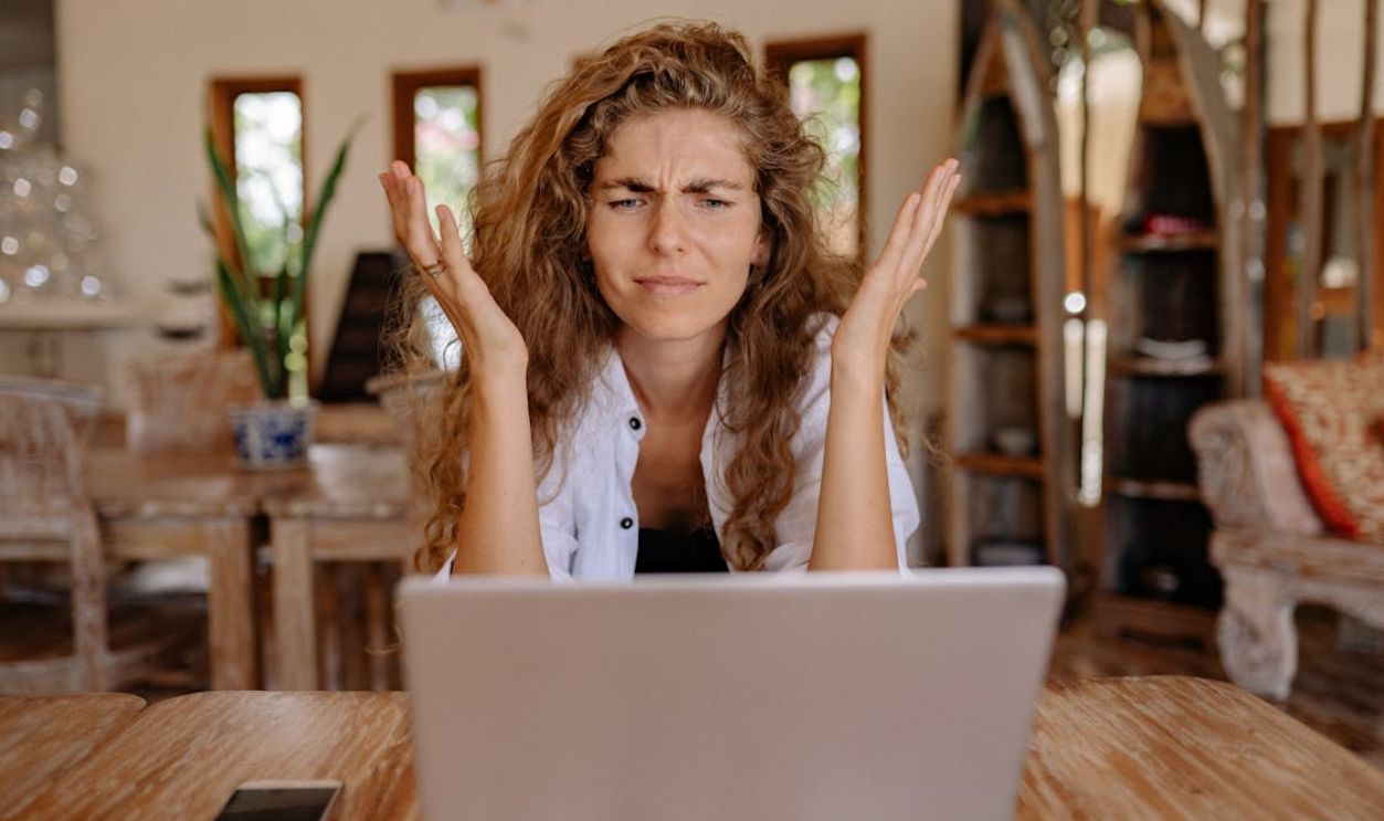 Photo of Woman Showing Frustrations on Her Face