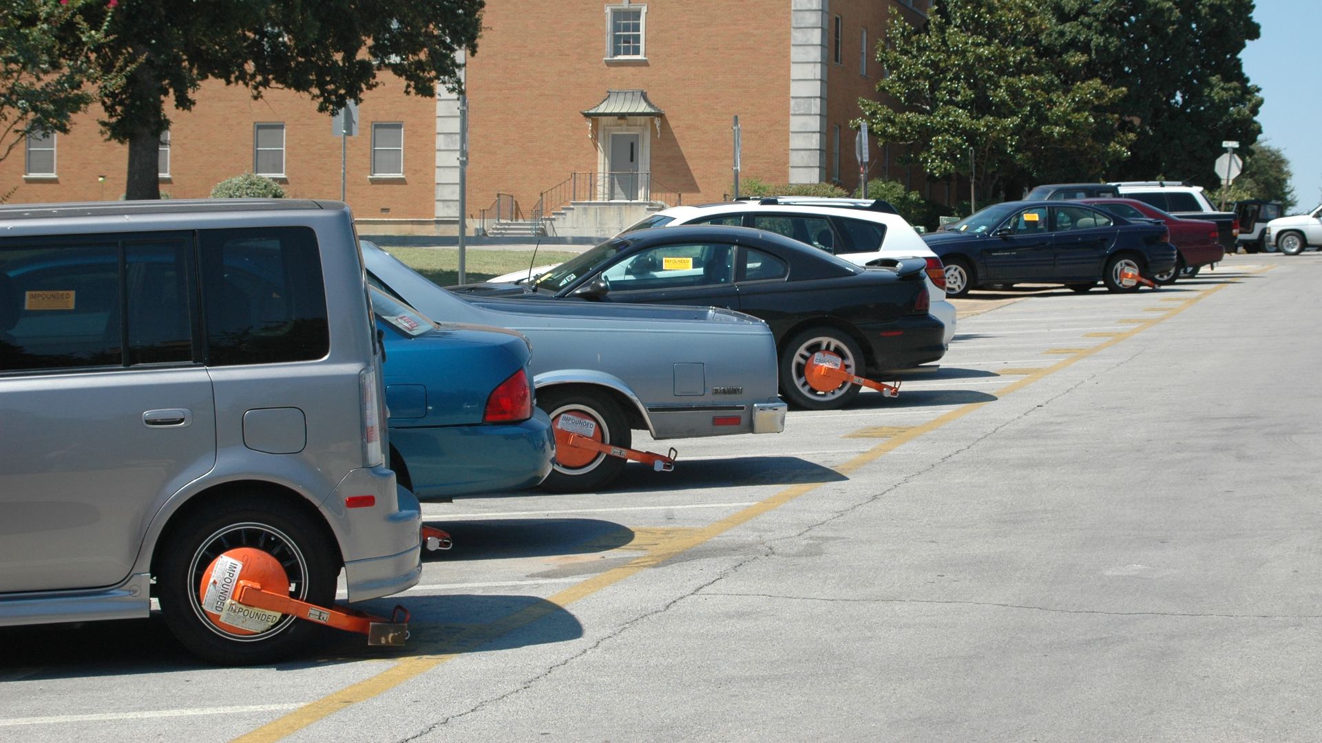 It looks like the parking cops had fun this morning. Taken on my way into work at UNT.