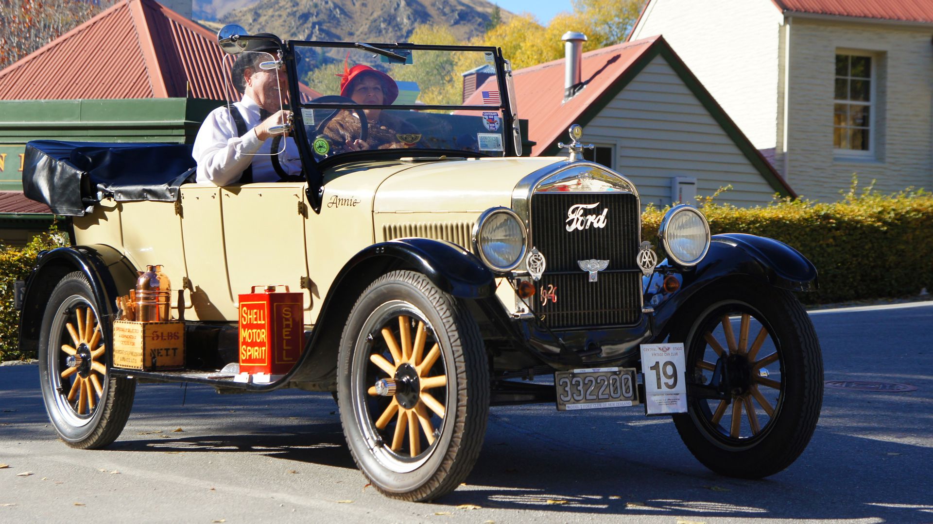 The Ford Model T (colloquially known as the Tin Lizzie, T‑Model Ford, Model T Ford, or T) is an automobile that was produced by Henry Ford's Ford Motor Company from October 1, 1908 to May 27, 1927. It is generally regarded as the first affordable automobile, the car that opened travel to the common middle-class American; some of this was because of Ford's efficient fabrication, including assembly line production instead of individual hand crafting. The Ford Model T was named the world's most influential car of the 20th century in an international poll.