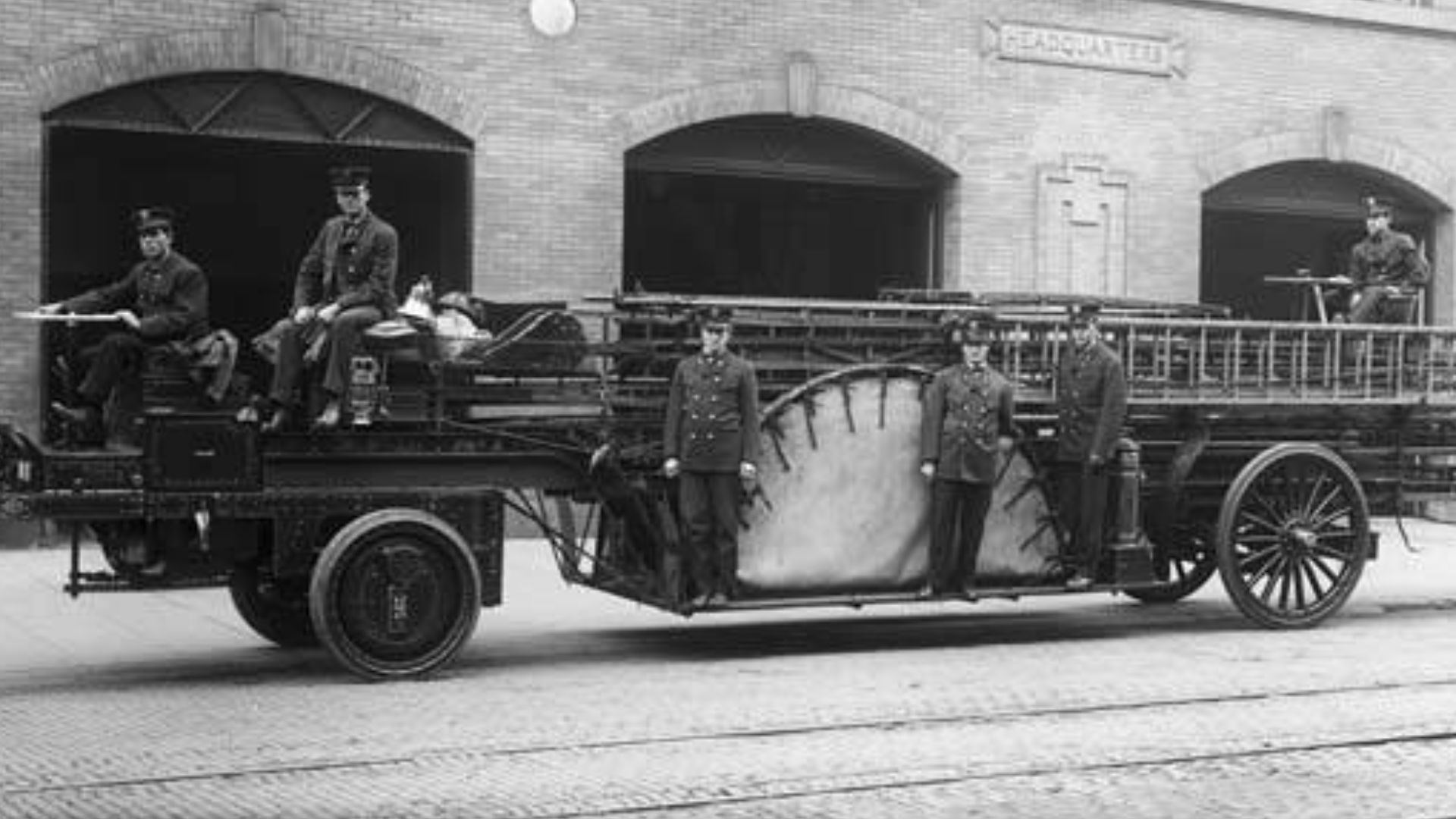 When Fire Chief Frank Stetson was appointed in 1911, he made it his mission to replace all of Seattle's horse-drawn fire equipment with motorized trucks. In 1916, the company stationed at Fire Station No. 10 got a new motorized hook-and-ladder truck.
This photo, probably taken sometime between 1916 and 1920, shows the front wheel drive hook-and-ladder truck parked outside Seattle's Fire Station No. 10.

Subjects (LCTGM): Fire engines & equipment; Fire stations; Seattle (Wash.