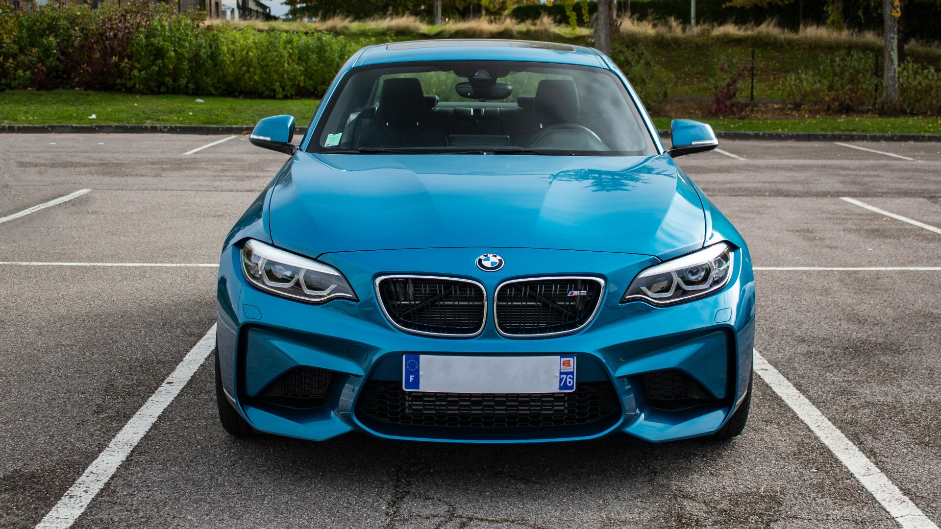 blue BMW vehicle