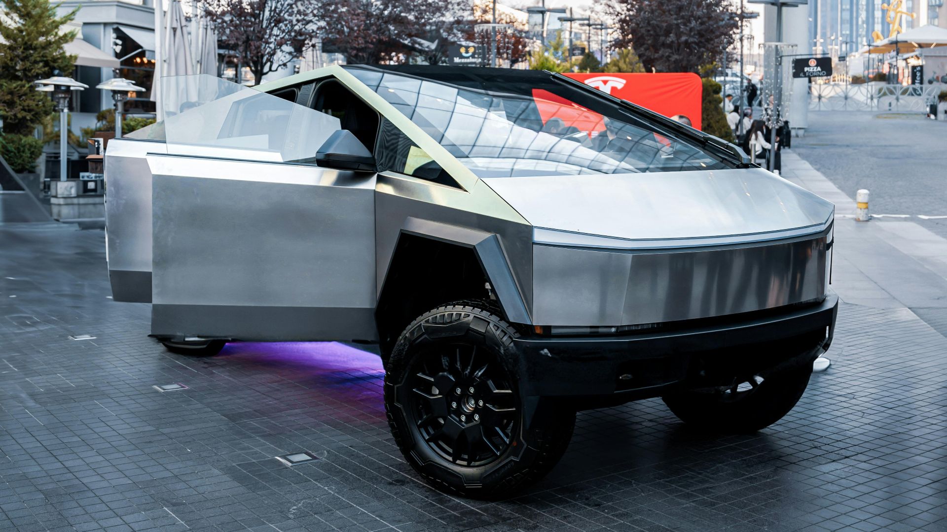 Modern vehicle showcased in urban Ankara setting, embodying futuristic design and architecture.