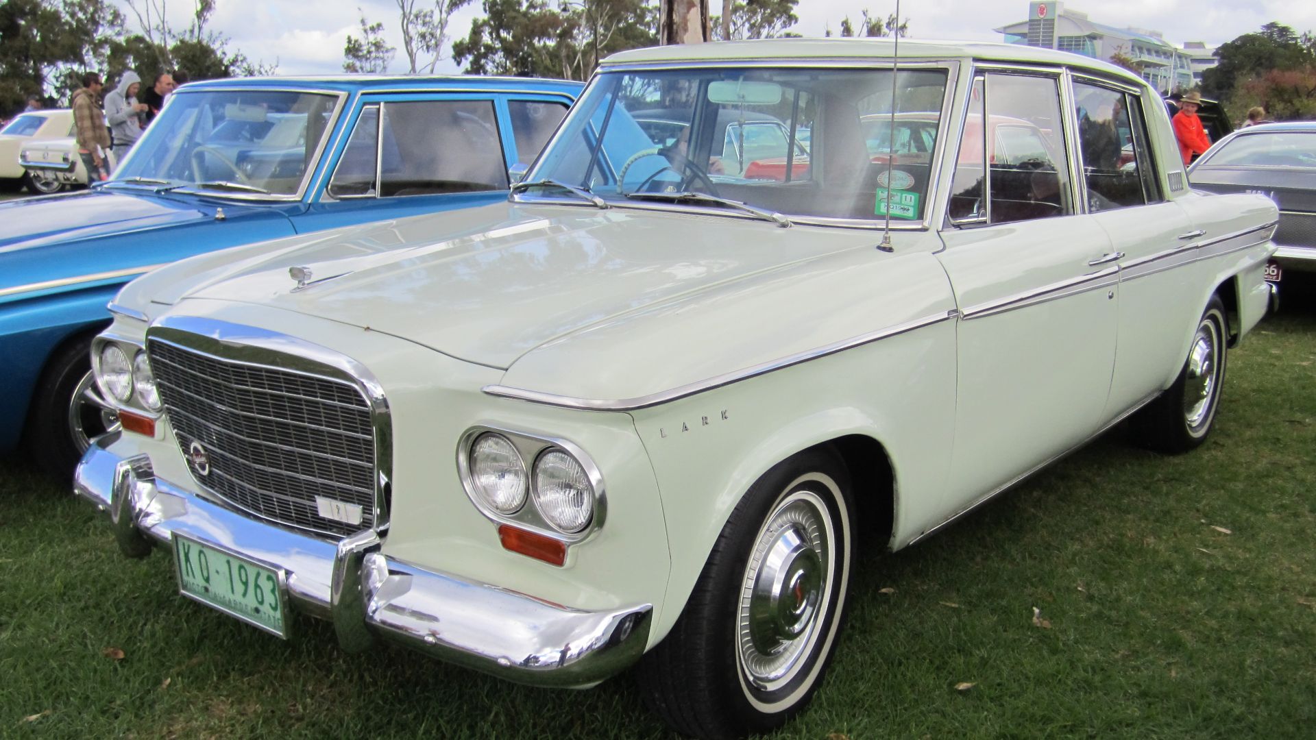 The compact Lark was introduced in 1959 and available in Deluxe or Regal. Engines; VI; 170 6 cyl or VIII; 259 V8. 
In 1961 the LWB Cruiser was introduced with the 289 V8 option, Cruisers and Regals got 4 headlights. 
In 1962 all 4 doors had LWB and the top trim was the Daytona. 
In 1963 the Deluxe became the Standard and the supercharged  'Superlark' was available. 

New shape in 64; trim levels; Challenger, Commander and Cruiser (Daytona on Hardtops)