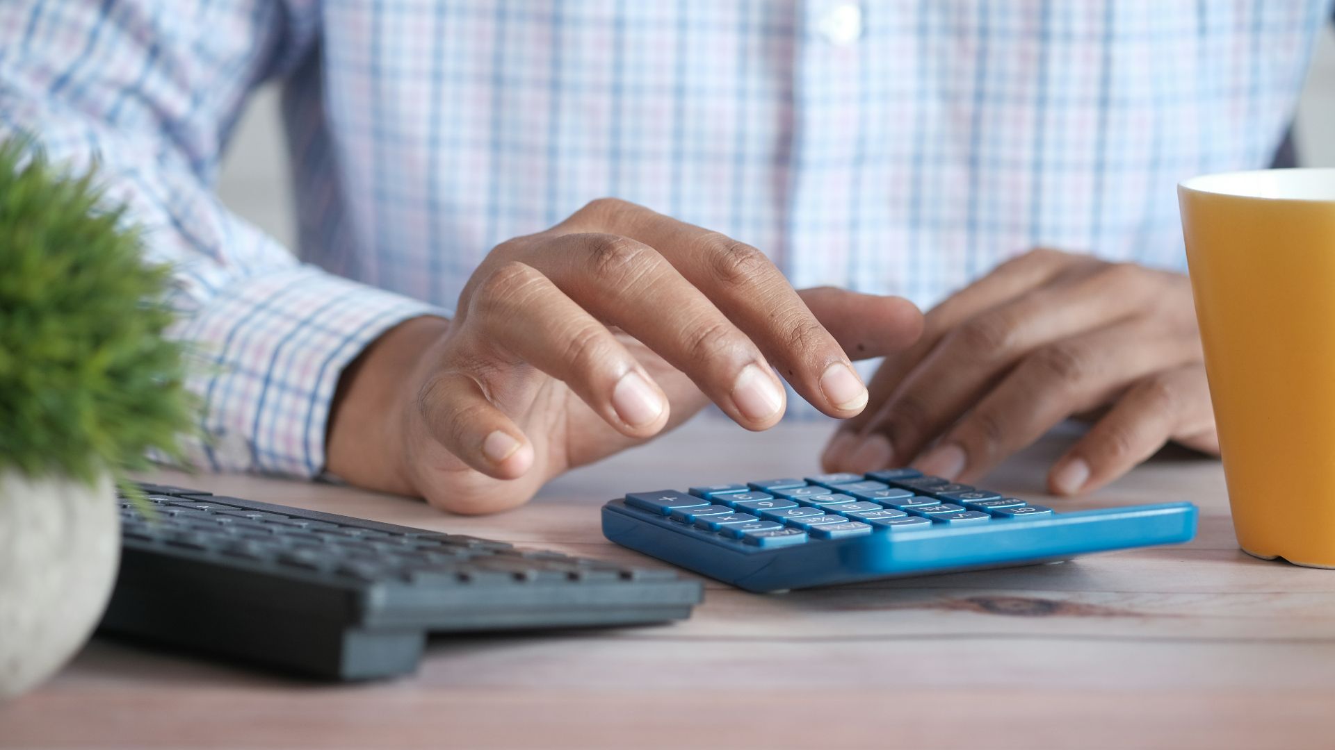 person using black computer keyboard