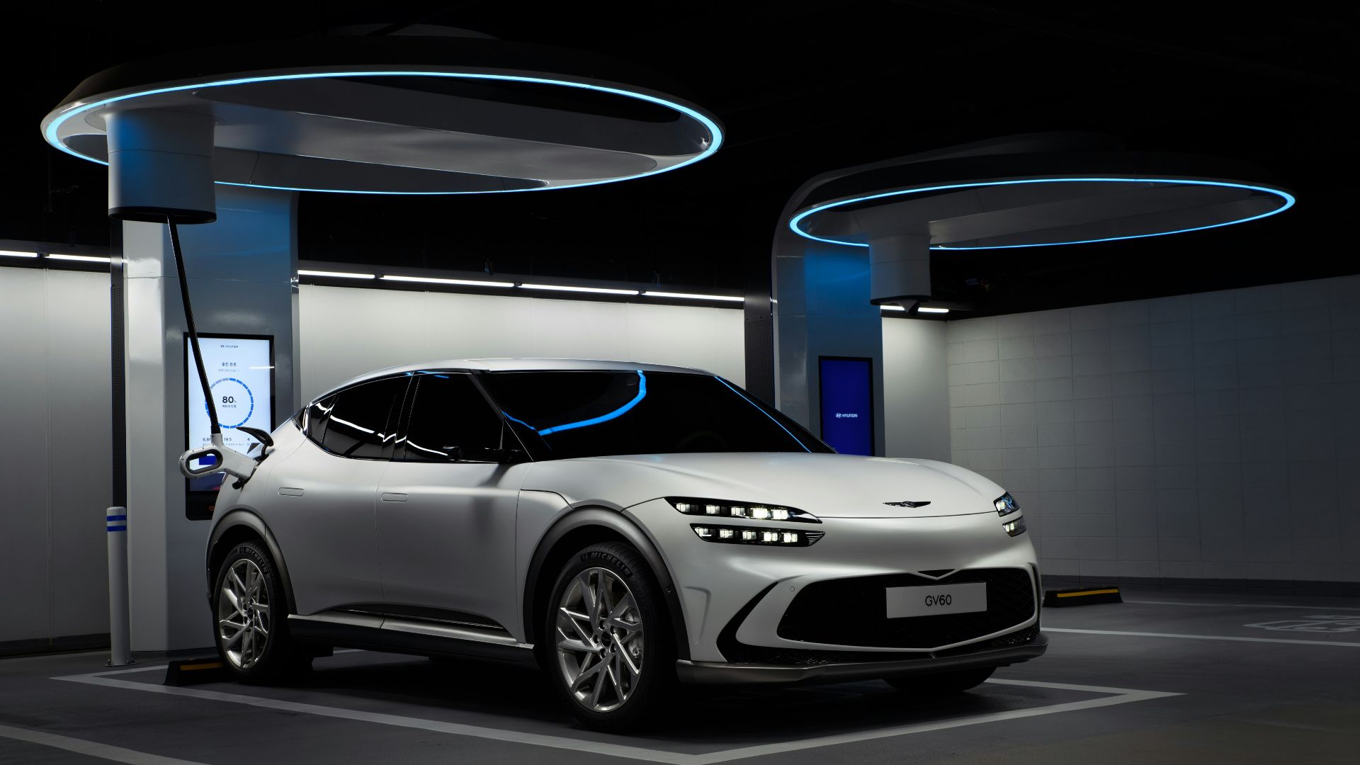 a white sports car in a showroom