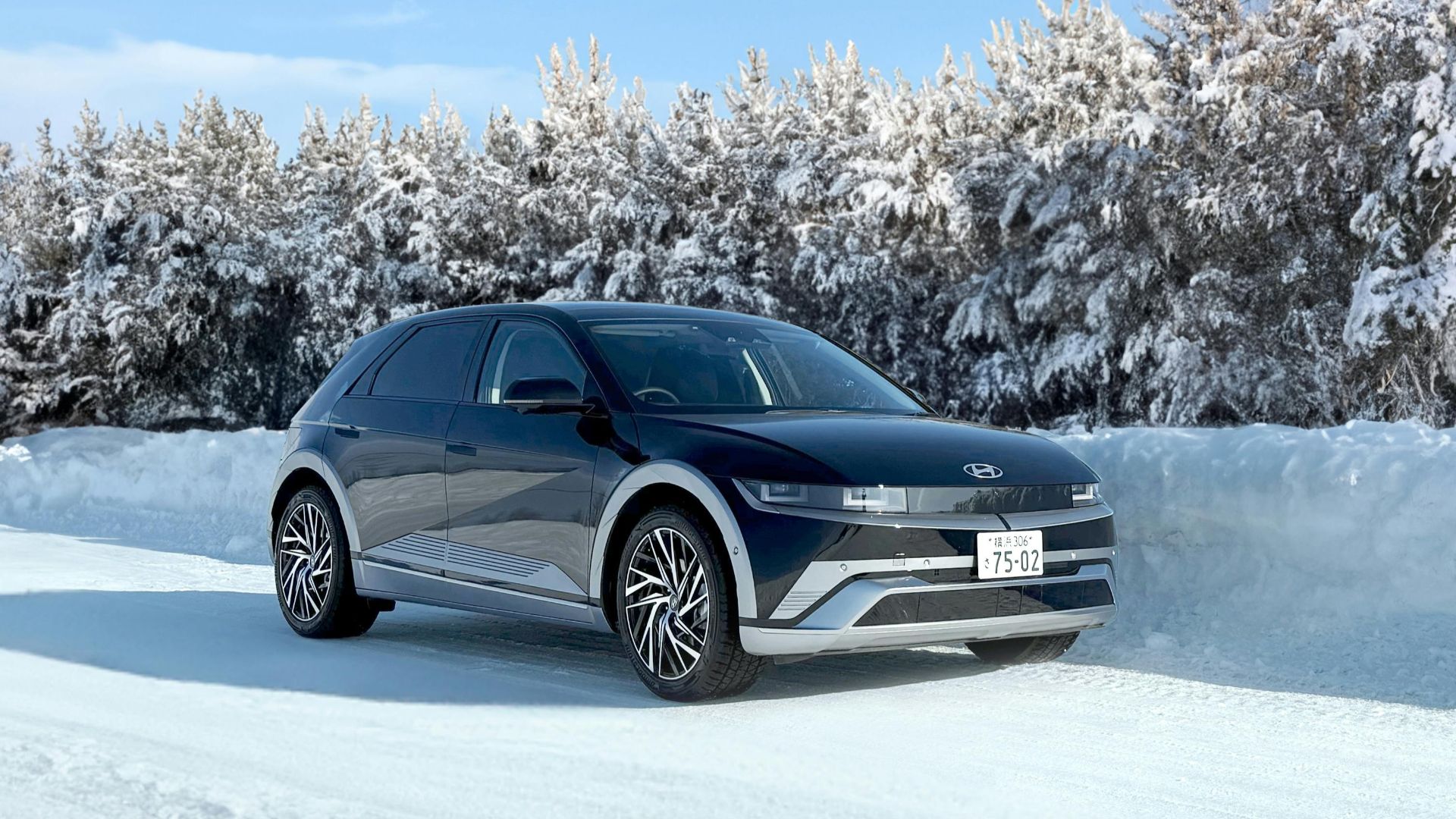 Hyundai Ioniq 5 electric car on a snowy road in Sapporo, Japan.
