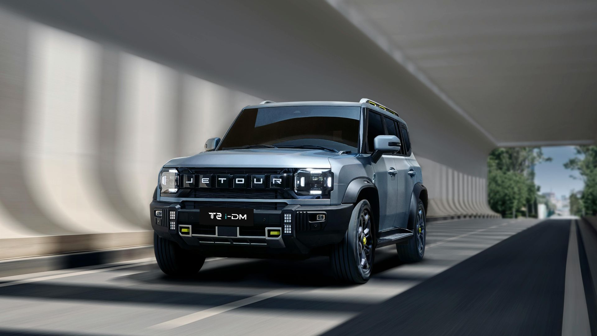Jetour T2 SUV cruising through a contemporary tunnel, showcasing sleek modern design.