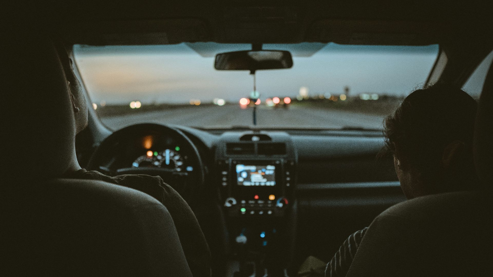 person driving car during night time