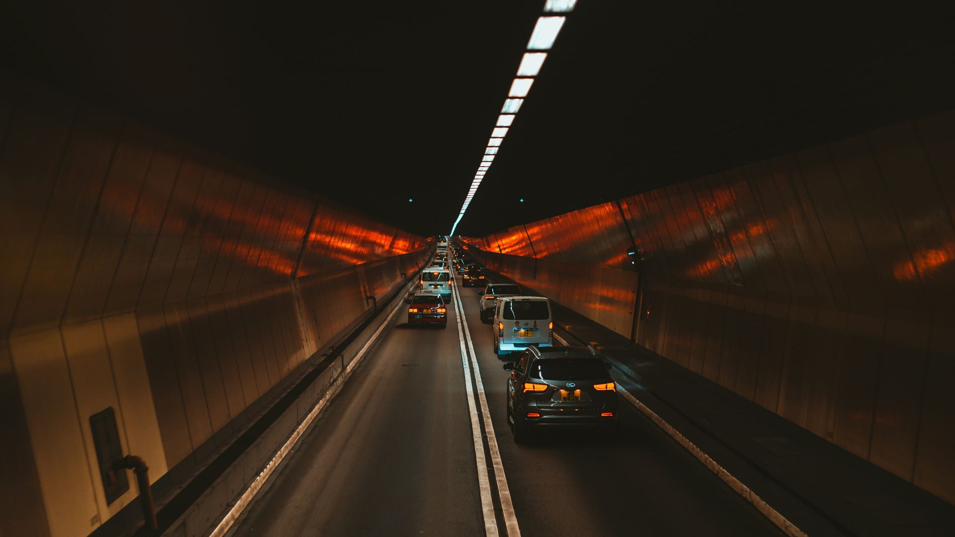 a couple of cars that are sitting in the street