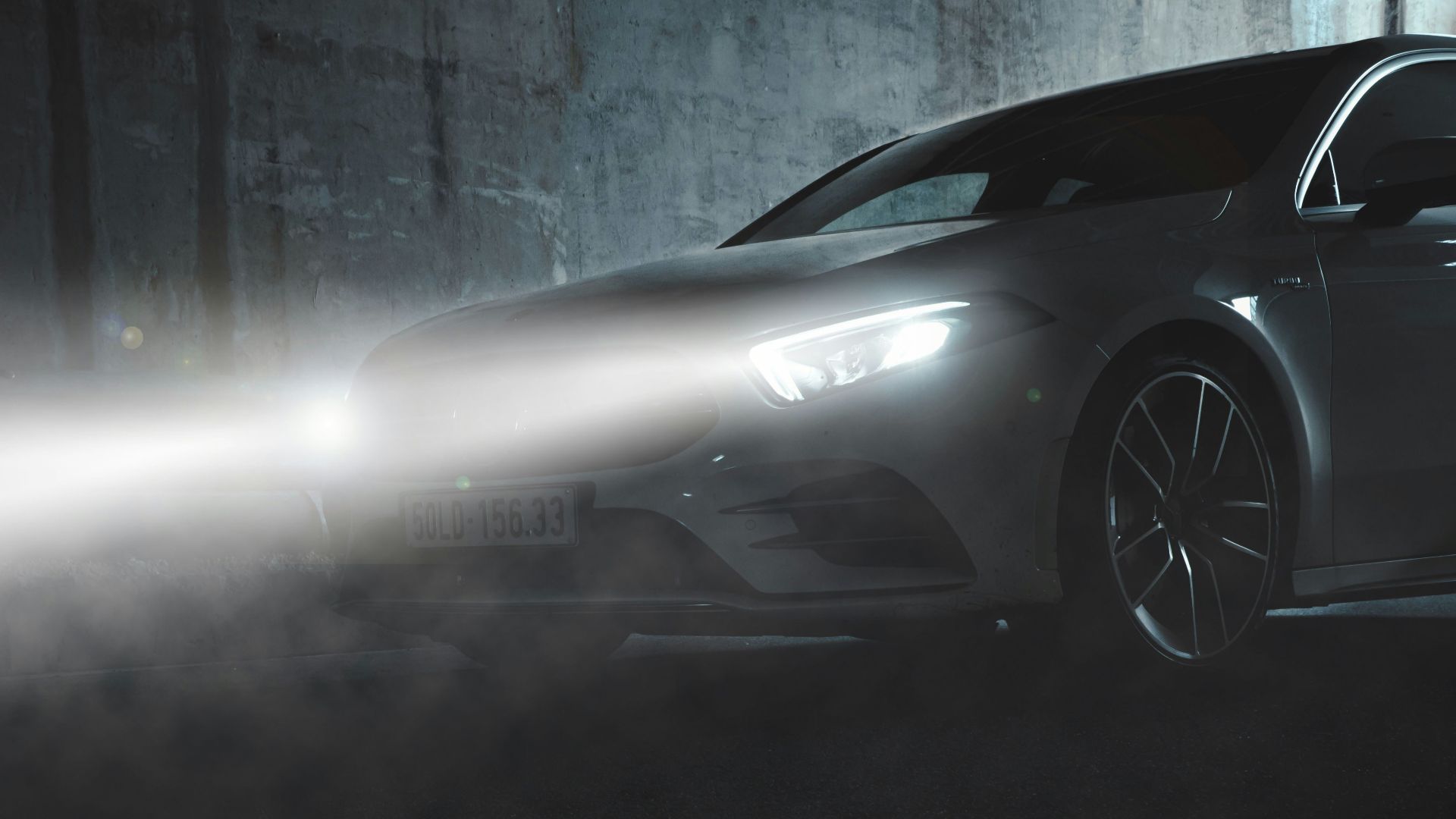 white car on road during daytime