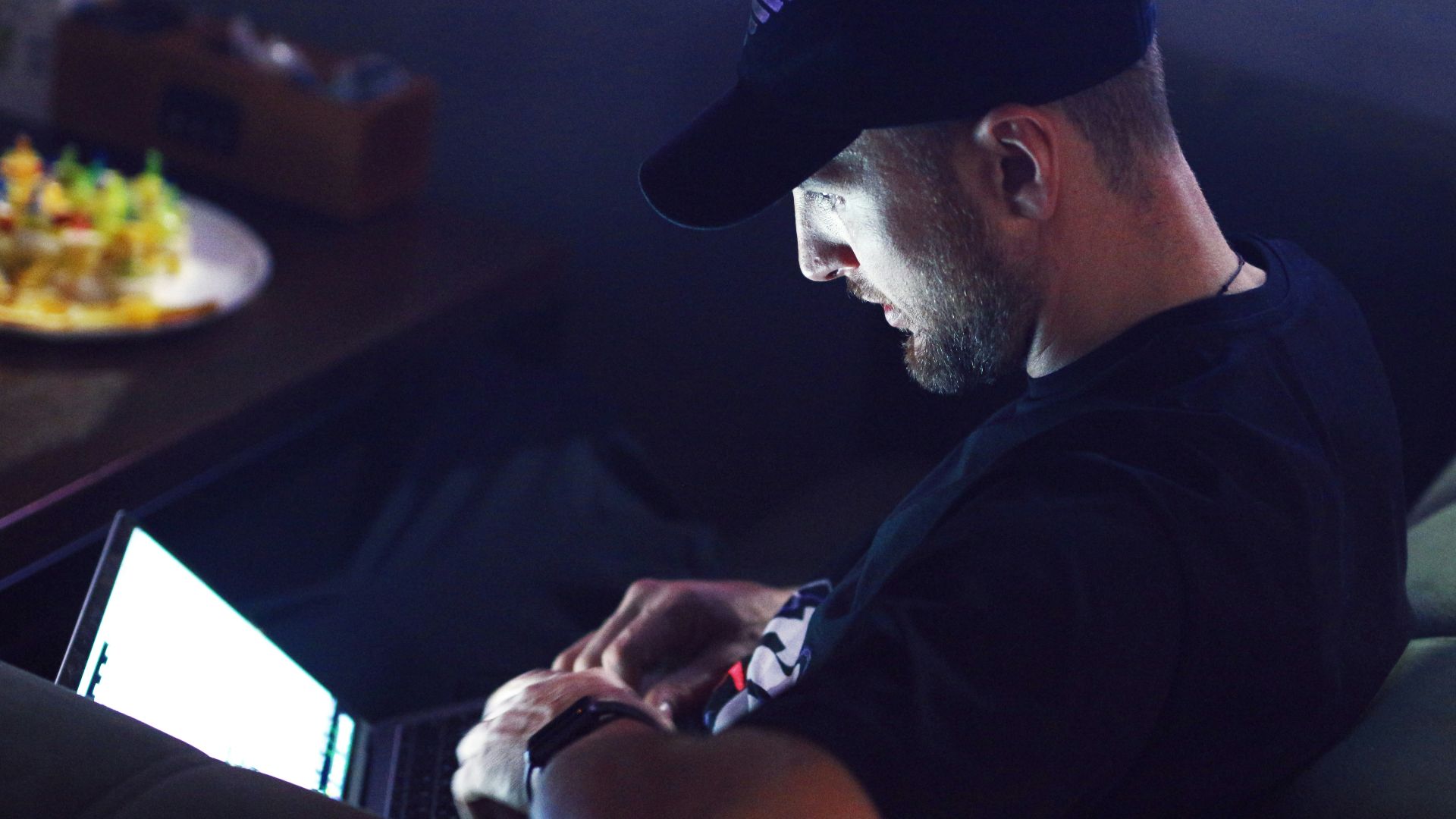a man sitting in front of a computer