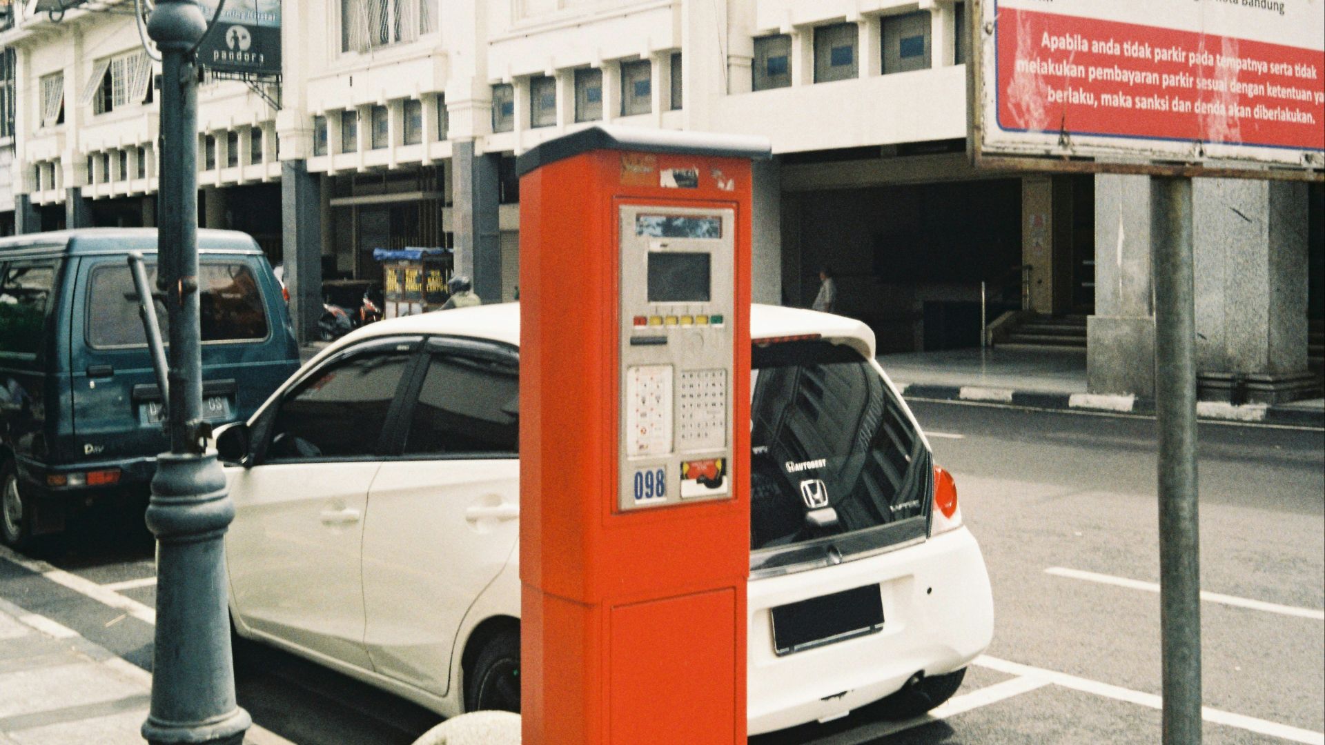 white and red car on road during daytime