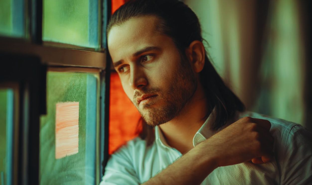 Man in Shirt by Window